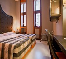 Orange Hotel Room