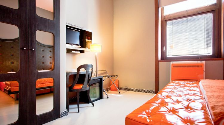 Orange Hotel Room