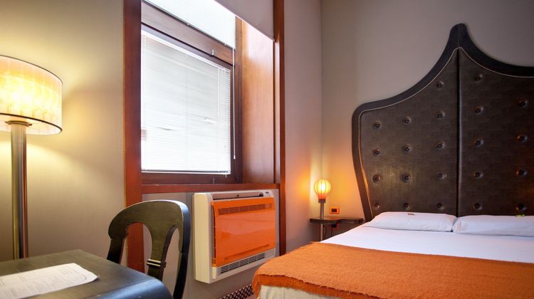 Orange Hotel Room