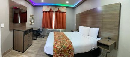 Buzen Suites Las Colinas Motel Room