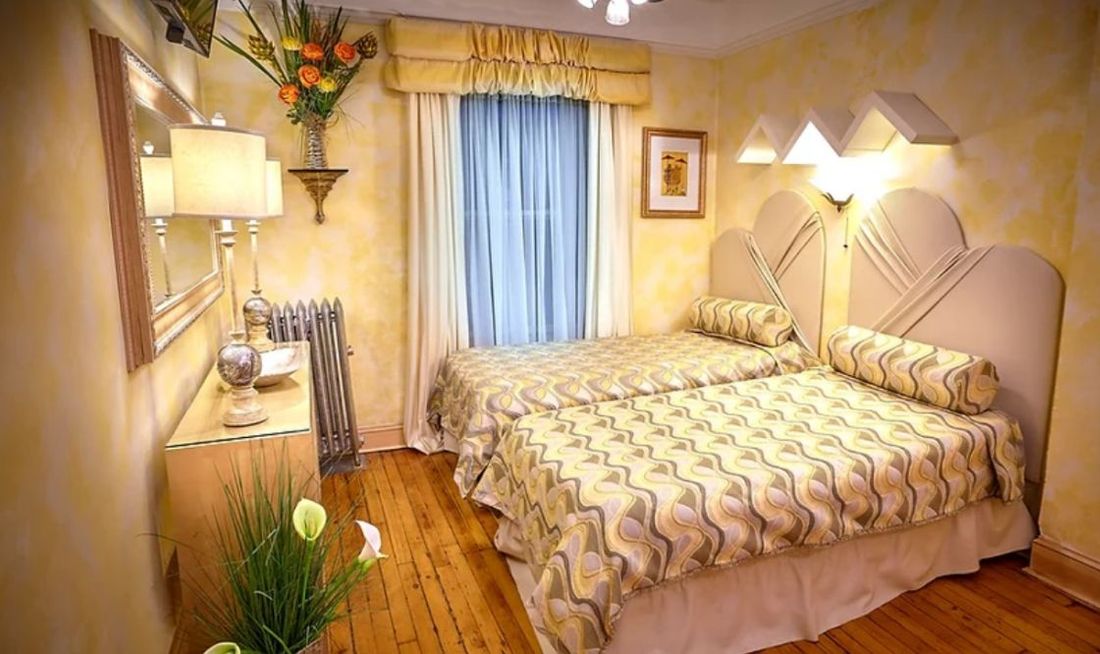 The International Cozy Inn Room