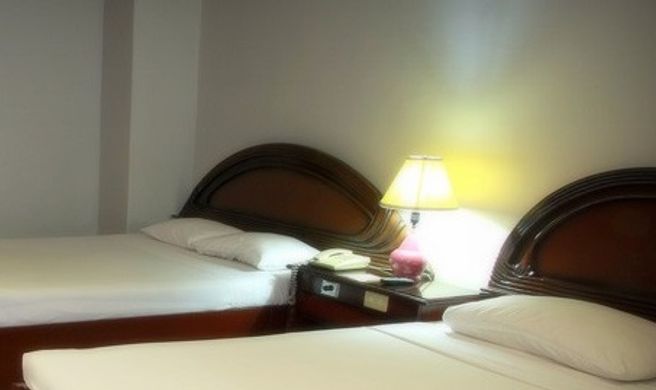 Holiday Plaza Hotel Room
