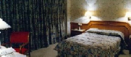 Hotel Cuatro Reyes Room