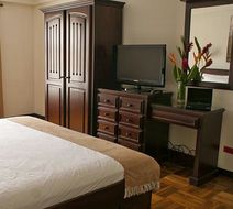 Plaza Real Suites & Apartments Room