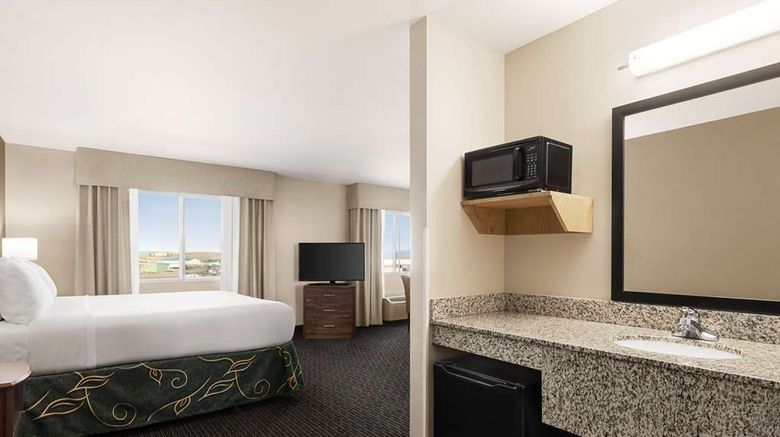 Baymont Inn  and  Suites Rawlins Room. Images powered by <a href="https://iceportal.shijigroup.com" target="_blank" rel="noopener">Ice Portal</a>.