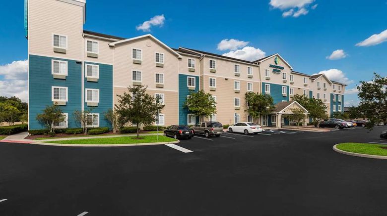 WoodSpring Suites Orlando East Exterior. Images powered by <a href="https://iceportal.shijigroup.com" target="_blank" rel="noopener">Ice Portal</a>.