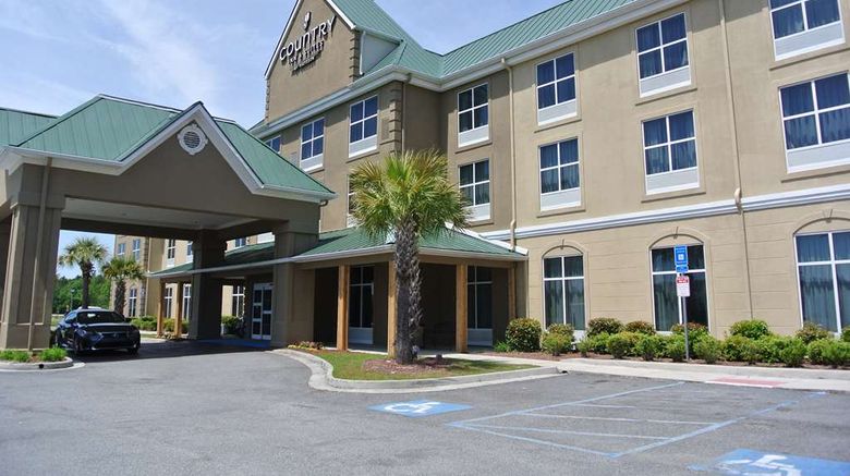 Country Inn  and  Suites Savannah Airport Exterior. Images powered by <a href="https://iceportal.shijigroup.com" target="_blank" rel="noopener">Ice Portal</a>.