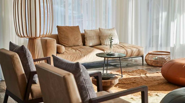 <b>7Pines Resort Ibiza Lobby</b>. Images powered by <a href=https://www.travelagewest.com/Hotels/Cala-Tarida-Spain/