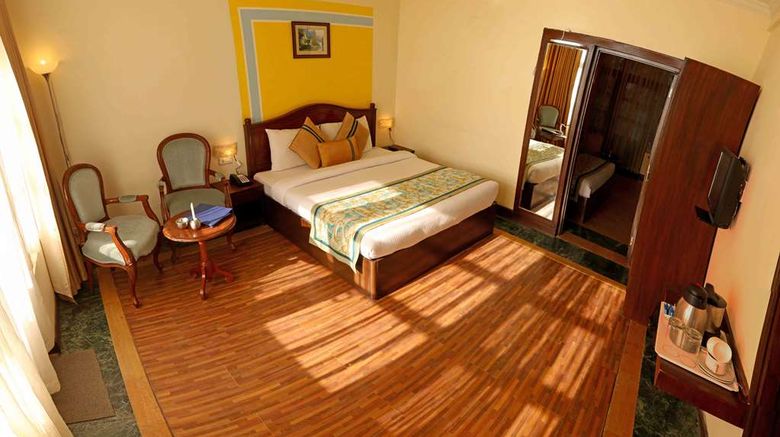 <b>Tulip Inn Mussoorie Barlowganj Room</b>. Images powered by <a href="https://iceportal.shijigroup.com/" title="IcePortal" target="_blank">IcePortal</a>.