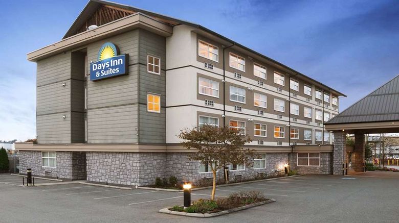 Days Inn  and  Suites Langley Exterior. Images powered by <a href="https://iceportal.shijigroup.com" target="_blank" rel="noopener">Ice Portal</a>.
