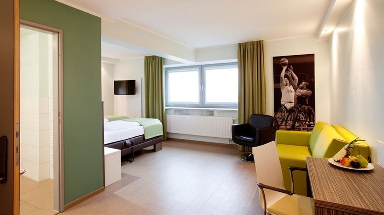 <b>TOP EMBRACE HotelSportforum Room</b>. Images powered by <a href=https://www.travelagewest.com/Hotels/Rostock-Germany/