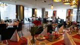 <b>TOP EMBRACE HotelSportforum Restaurant</b>. Images powered by <a href=https://www.travelagewest.com/Hotels/Rostock-Germany/