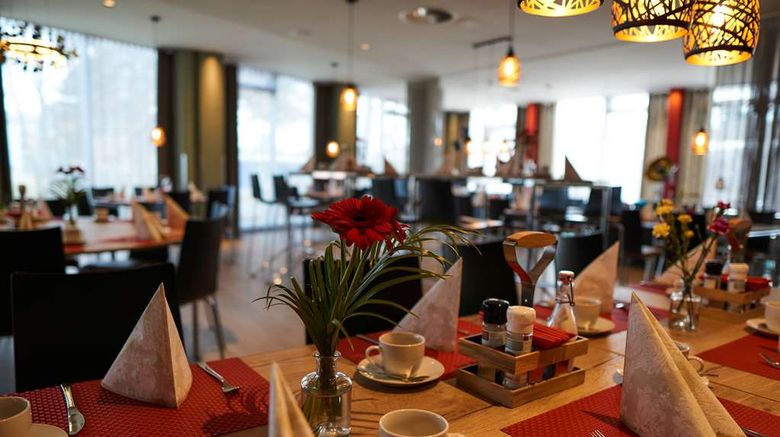 <b>TOP EMBRACE HotelSportforum Restaurant</b>. Images powered by <a href=https://www.travelagewest.com/Hotels/Rostock-Germany/