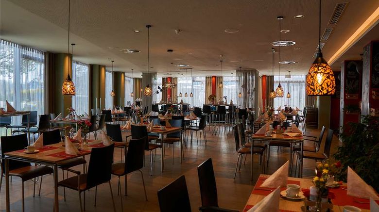 <b>TOP EMBRACE HotelSportforum Restaurant</b>. Images powered by <a href=https://www.travelagewest.com/Hotels/Rostock-Germany/