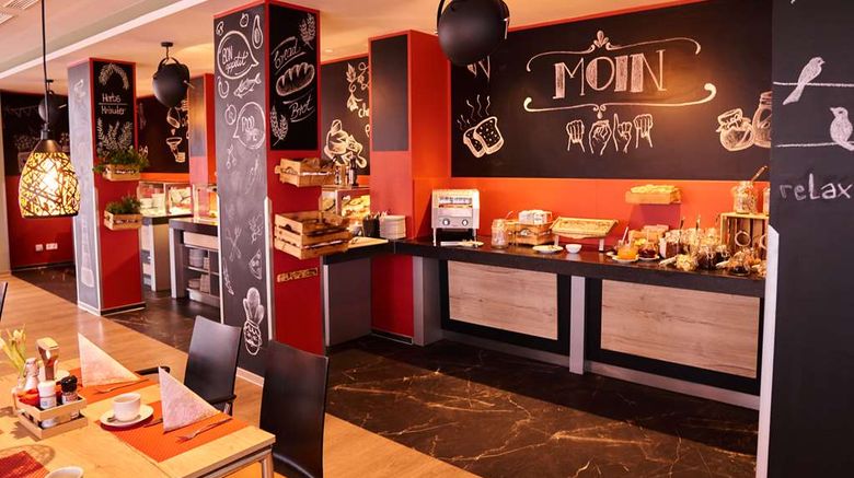<b>TOP EMBRACE HotelSportforum Restaurant</b>. Images powered by <a href=https://www.travelagewest.com/Hotels/Rostock-Germany/