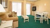 The Enclave Hotel & Suites Room