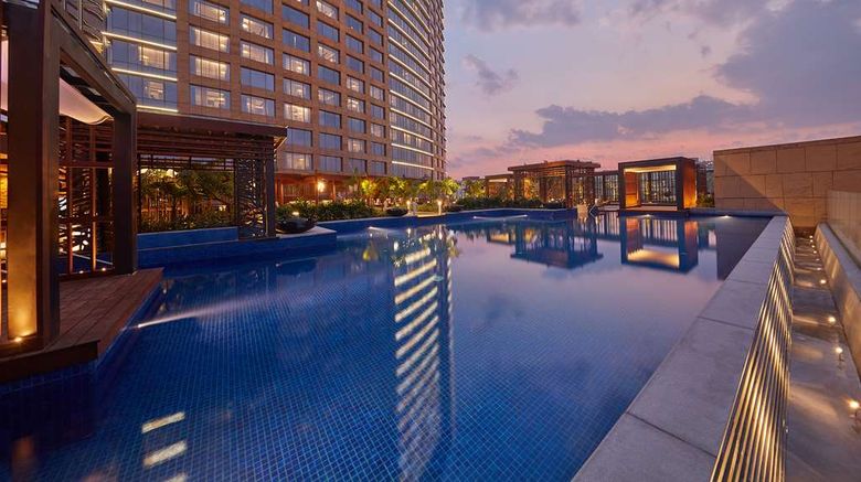 <b>Conrad Bengaluru Pool</b>. Images powered by <a href=https://www.travelagewest.com/Hotels/Bengaluru-India/