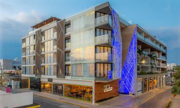 The Fives Downtown Hotel Curio by Hilton