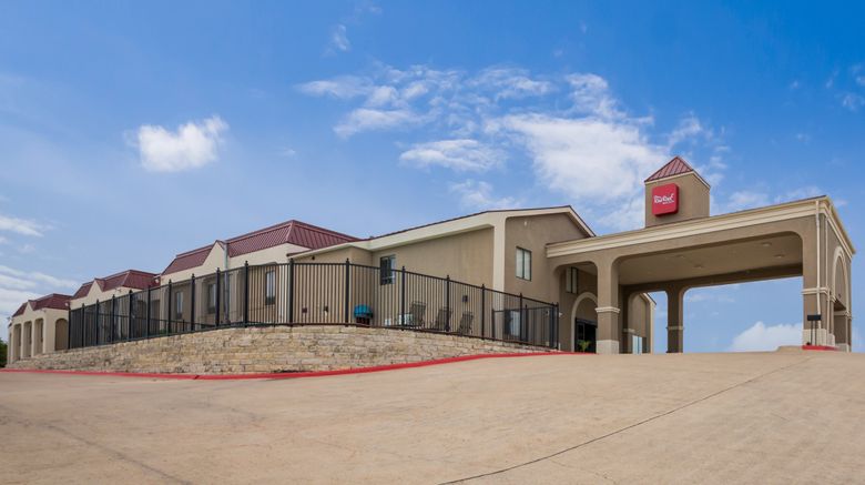 Red Roof Inn  and  Suites Austin East-Manor Exterior. Images powered by <a href="http://www.leonardo.com" target="_blank" rel="noopener">Leonardo</a>.