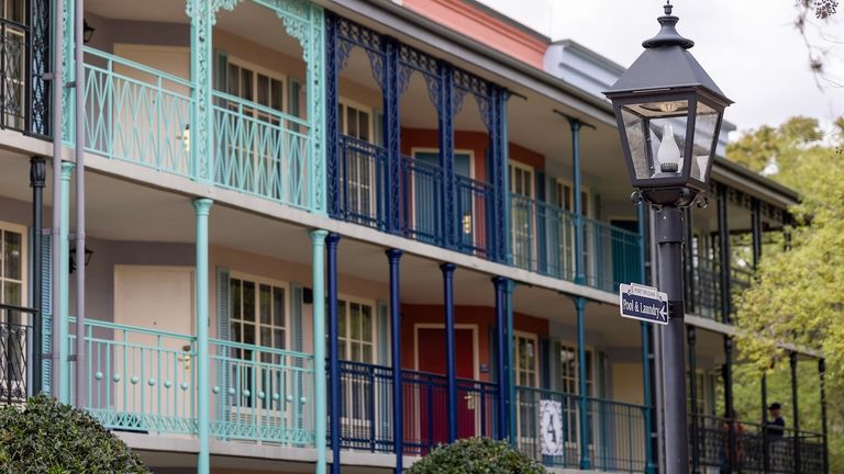 Port Orleans Resort – French Quarter features iconic New Orleans details such as gas lamps and wrought-iron balconies.