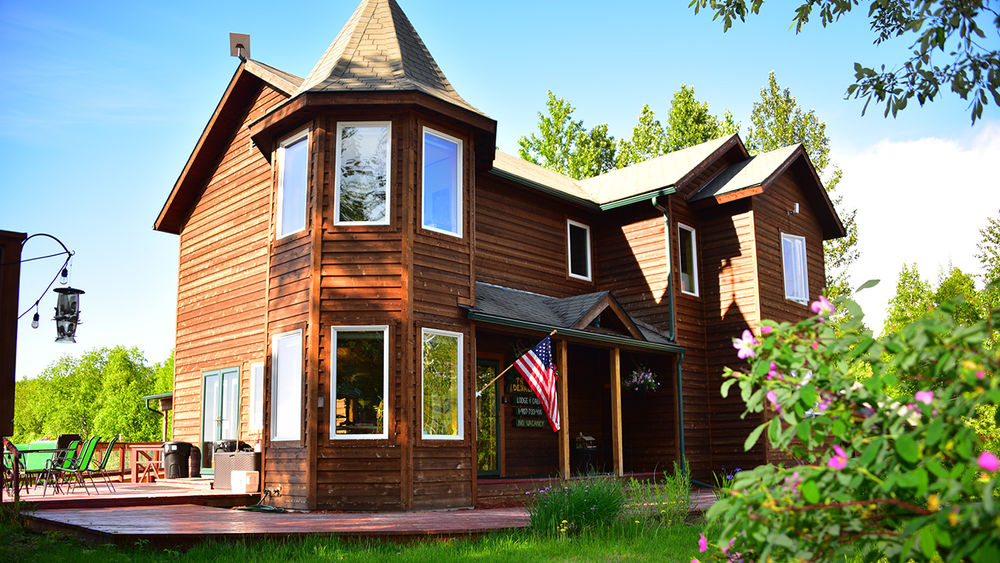Talkeetna Denali View Lodge & Cabins is situated on a bluff above a surrounding forest, for unobscured views of Denali.