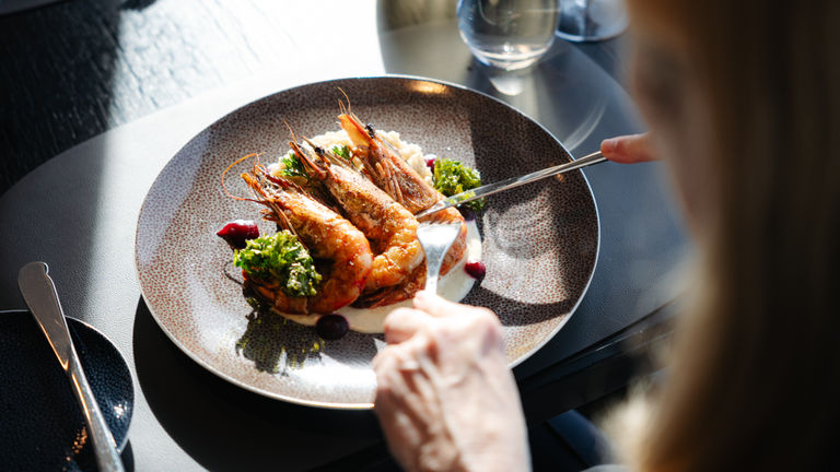 Dining at Lindstrom is included for suite guests.