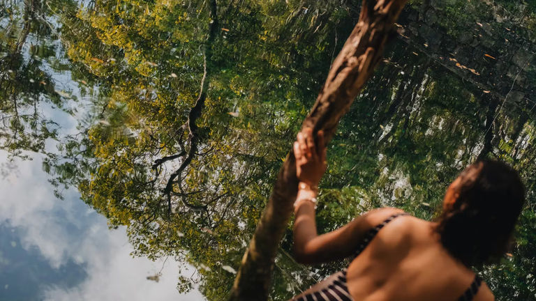 Clients explore the clear waters of Tulum on day two of the Mexico itinerary.