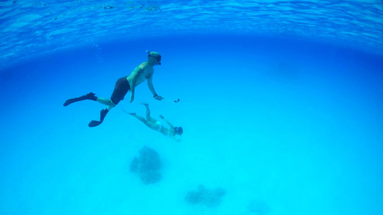 After practicing their new skills, guests enjoy activities such as snorkeling.
