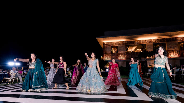 The sangeet portion of a South Asian wedding includes music and dancing that celebrates a couple’s union.
