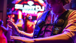Haptic vests translate music and sound effects into physical sensations for guests at silent discos across Disney Cruise Line’s fleet.
