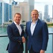 Sandals executive chairman Adam Stewart, left, with Royal Caribbean Group CEO Jason Liberty