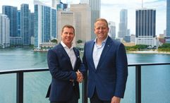 Sandals executive chairman Adam Stewart, left, with Royal Caribbean Group CEO Jason Liberty.