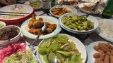 After a lesson in Chinese crafts and dumpling making, travel advisors enjoy a homemade meal.
