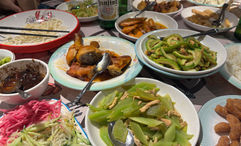 After a lesson in Chinese crafts and dumpling making, travel advisors enjoy a homemade meal.