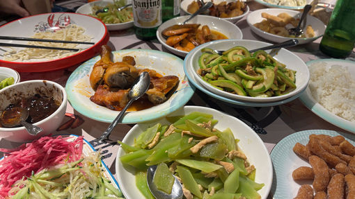 After a lesson in Chinese crafts and dumpling making, travel advisors enjoy a homemade meal.