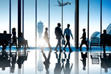 business travelers in an airport terminal