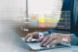 Business professional working on laptop with digital dashboard, data analytics, project management timeline, KPI metrics, business intelligence reports performance monitoring for strategic planning