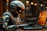 Robot bot programmer sits at the computer