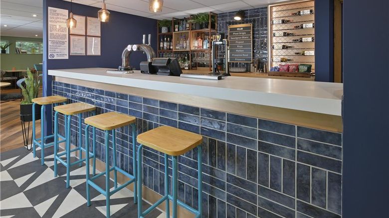 <b>Travelodge London Whetstone Restaurant</b>. Images powered by <a href="https://iceportal.shijigroup.com/" title="IcePortal" target="_blank">IcePortal</a>.