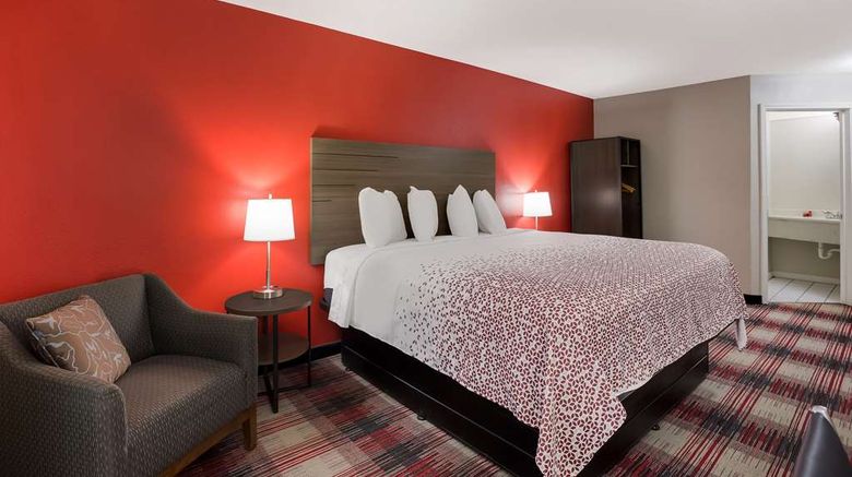 <b>SureStay By Best Western Higginsville Room</b>. Images powered by <a href="https://iceportal.shijigroup.com/" title="IcePortal" target="_blank">IcePortal</a>.