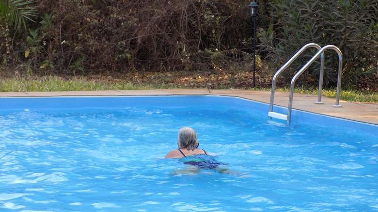 <b>Octagon Lodge, Karatu Pool</b>. Images powered by <a href="https://iceportal.shijigroup.com/" title="IcePortal" target="_blank">IcePortal</a>.