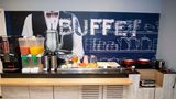 <b>Ibis Budget Divinopolis Restaurant</b>. Images powered by <a href="https://iceportal.shijigroup.com/" title="IcePortal" target="_blank">IcePortal</a>.