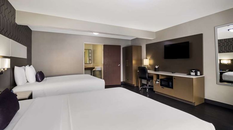 <b>Sunset West Hotel, SureStay Coll By BW Room</b>. Images powered by <a href="https://iceportal.shijigroup.com/" title="IcePortal" target="_blank">IcePortal</a>.