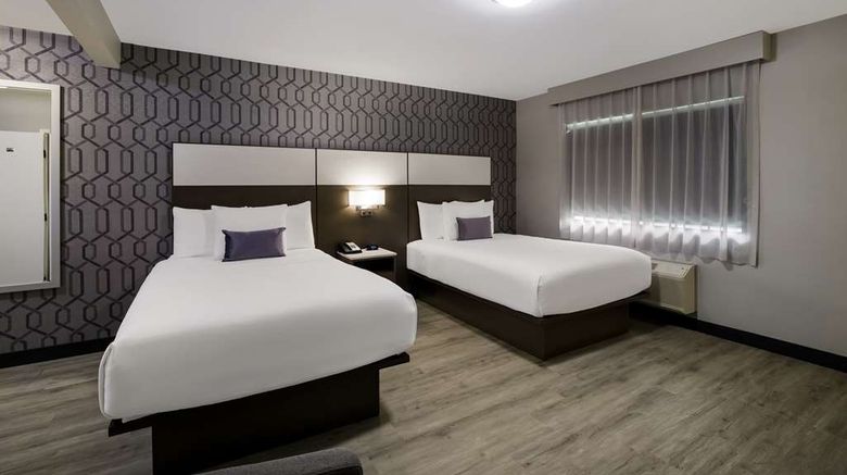 <b>Sunset West Hotel, SureStay Coll By BW Room</b>. Images powered by <a href="https://iceportal.shijigroup.com/" title="IcePortal" target="_blank">IcePortal</a>.