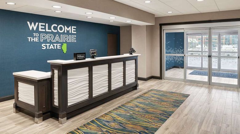 <b>Hampton Inn Champaign Southwest Lobby</b>. Images powered by <a href="https://iceportal.shijigroup.com/" title="IcePortal" target="_blank">IcePortal</a>.