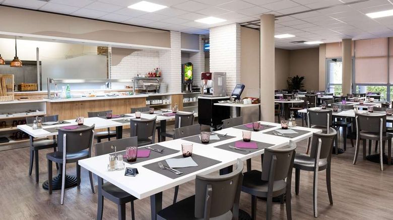 <b>Comfort Hotel Aeroport Lyon St Exupery Restaurant</b>. Images powered by <a href="https://iceportal.shijigroup.com/" title="IcePortal" target="_blank">IcePortal</a>.