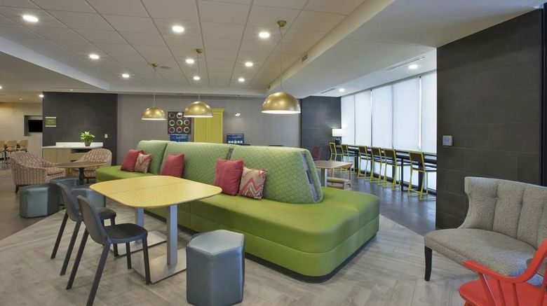 <b>Home2 Suites by Hilton Holland Lobby</b>. Images powered by <a href="https://iceportal.shijigroup.com/" title="IcePortal" target="_blank">IcePortal</a>.