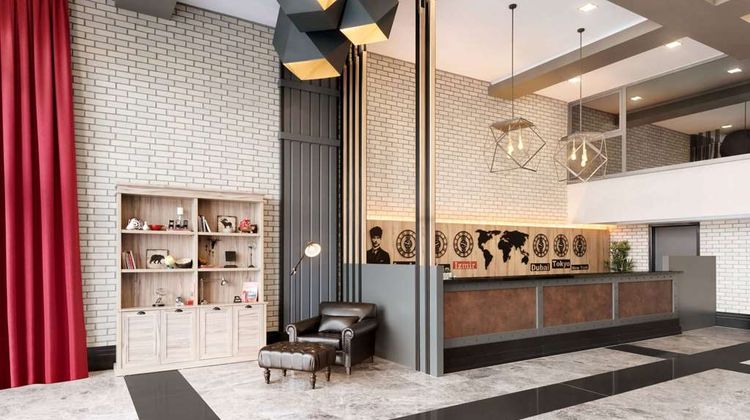 Ramada by Wyndham Tire Lobby