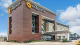 <b>La Quinta Inn & Suites Spring Exterior</b>. Images powered by <a href="https://iceportal.shijigroup.com/" title="IcePortal" target="_blank">IcePortal</a>.