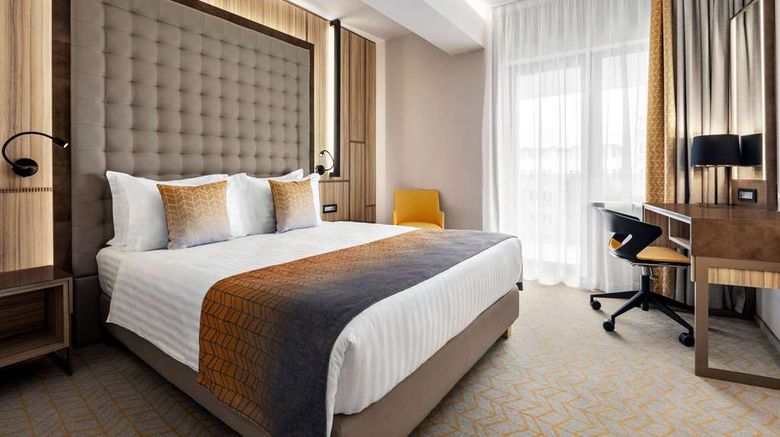 <b>Ramada by Wyndham Rimnicu Vilcea Room</b>. Images powered by <a href="https://iceportal.shijigroup.com/" title="IcePortal" target="_blank">IcePortal</a>.